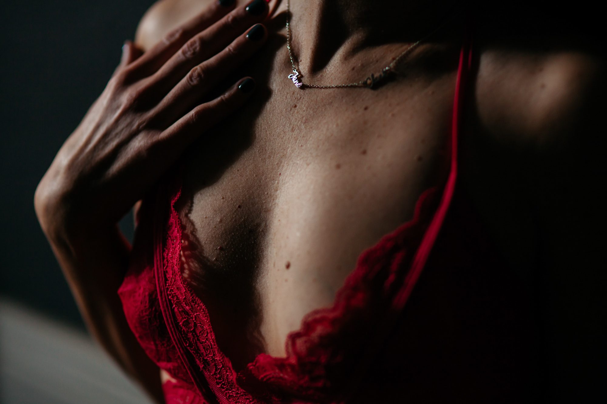 Cropped close-up photo of woman in lingerie