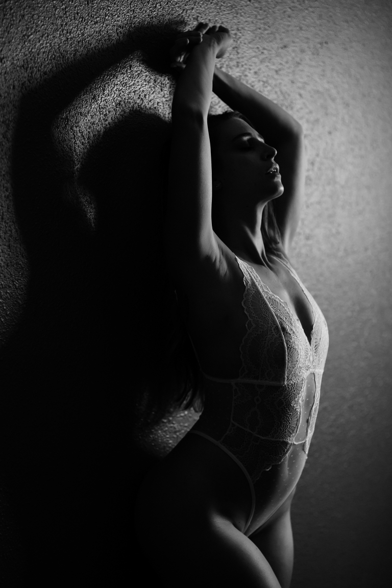 woman posing for boudoir photos