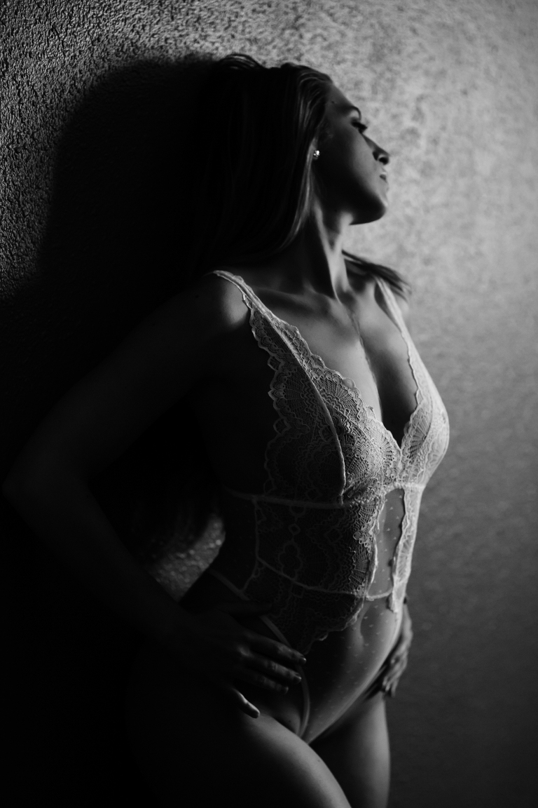 woman posing for boudoir photos