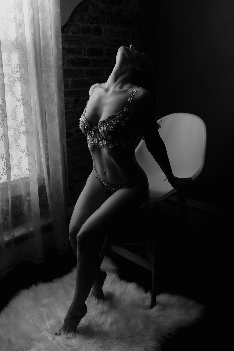 Denver boudoir client posing for boudoir photos