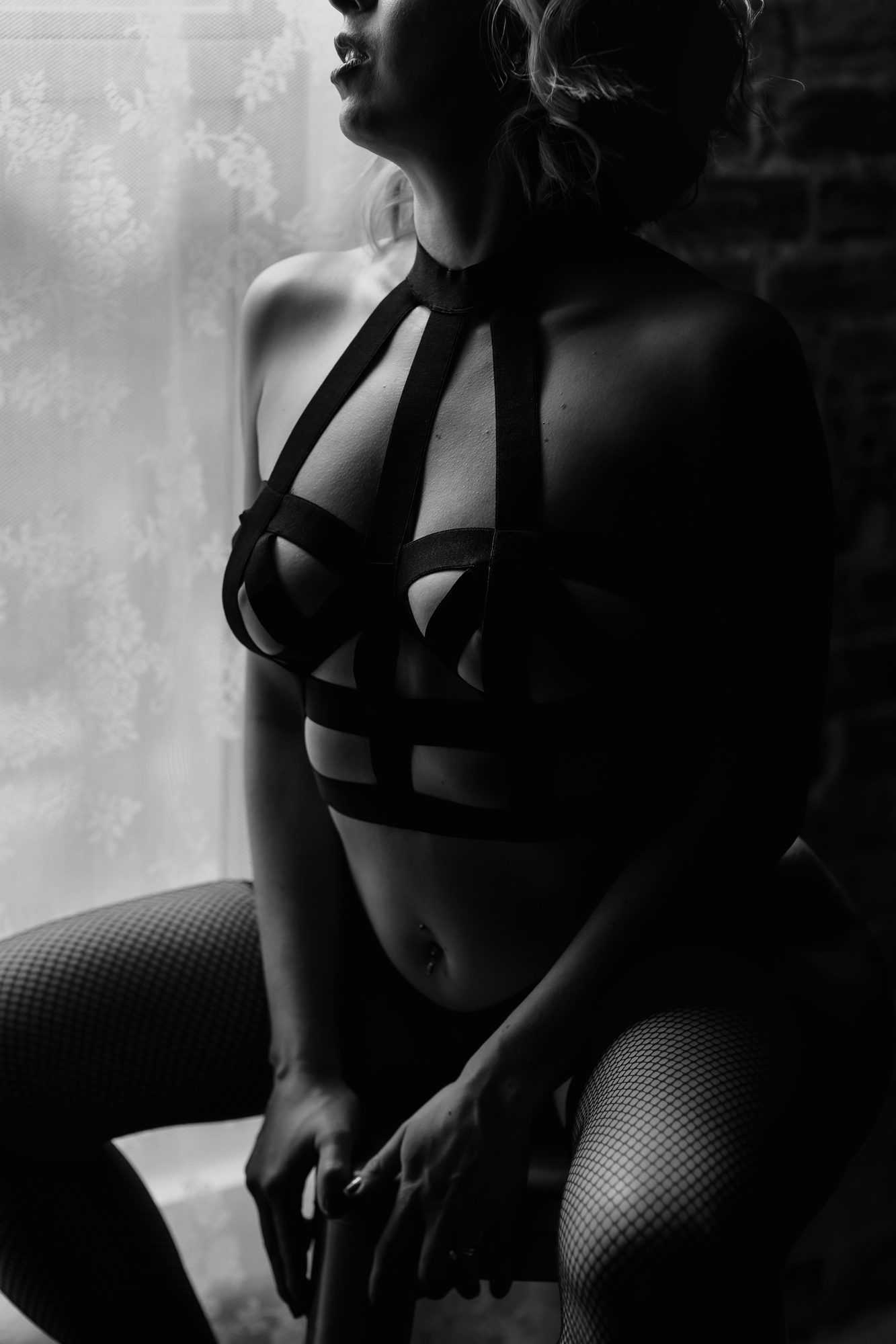 Denver boudoir client posing for photo