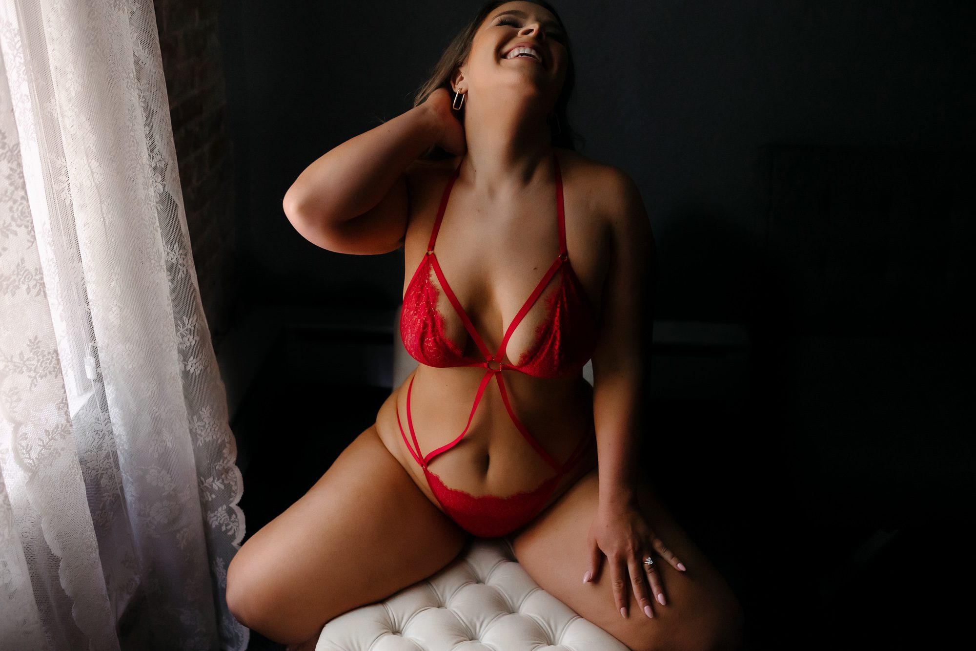 Denver boudoir client posing for photo