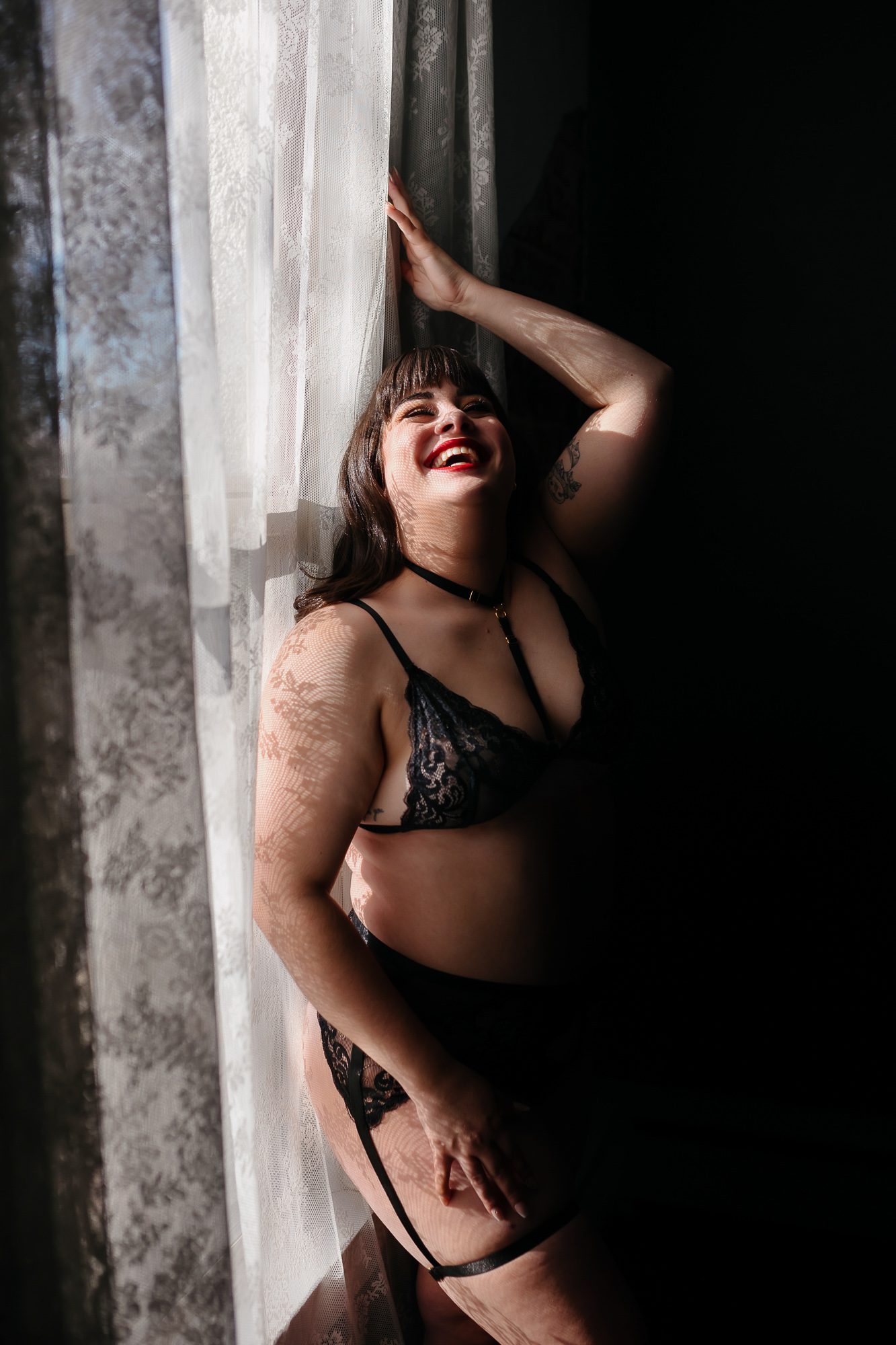 Boudoir Denver client posing for photo