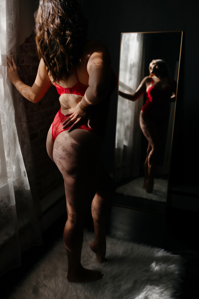 Denver boudoir client posing for boudoir shoot