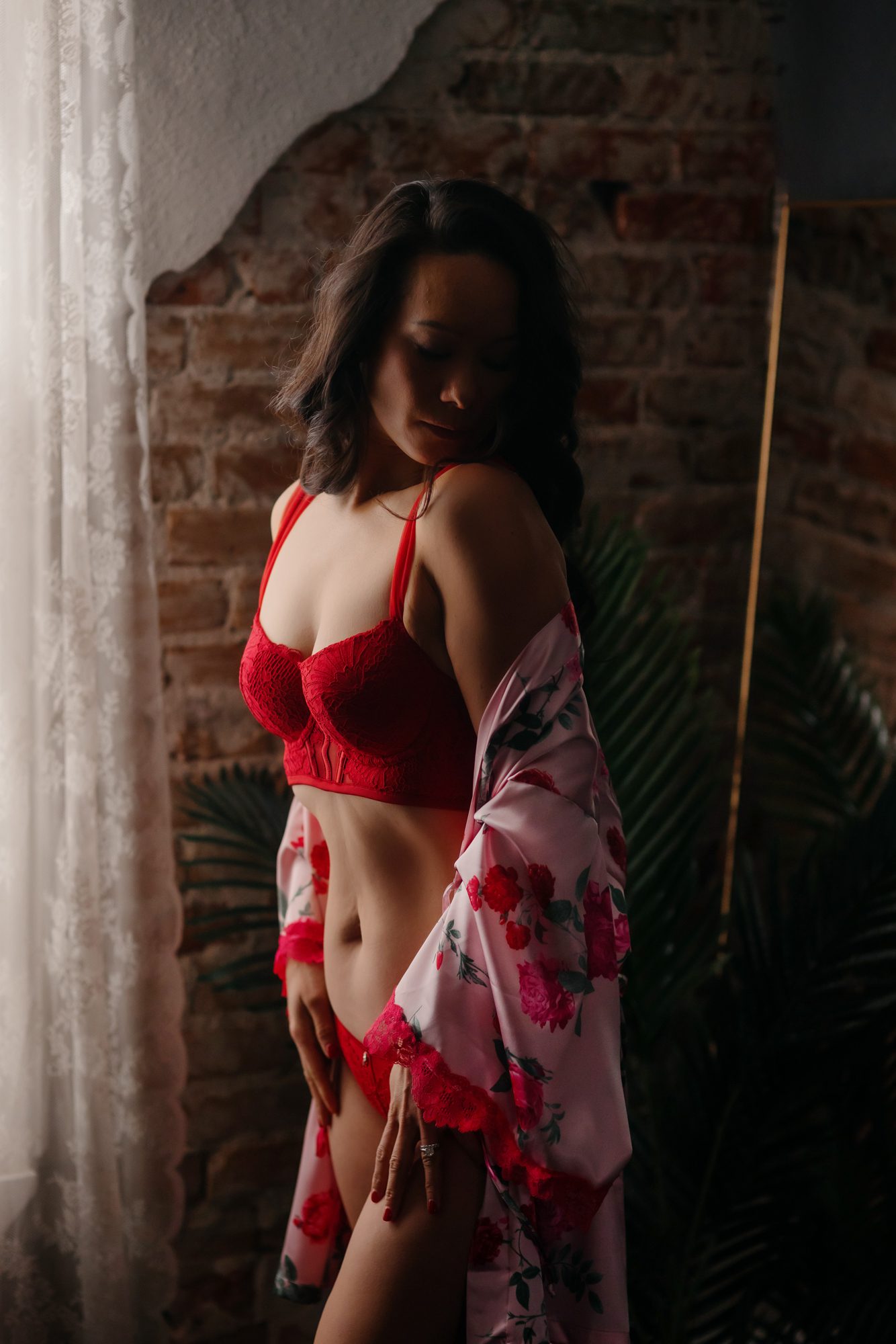 Denver boudoir photo shoot client posing for Valentine's Day boudoir session