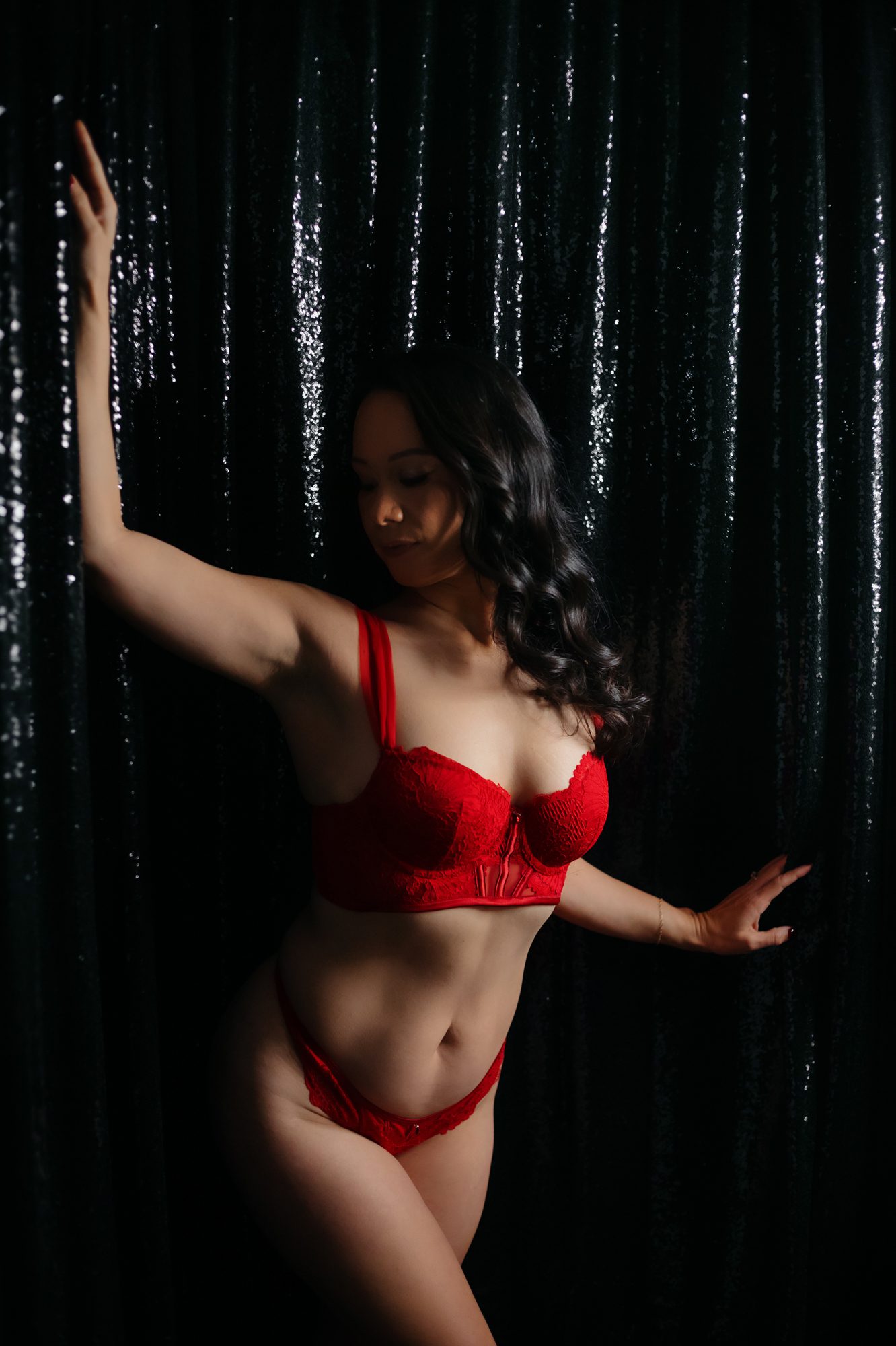 Denver boudoir photo shoot client posing for Valentine's Day boudoir session