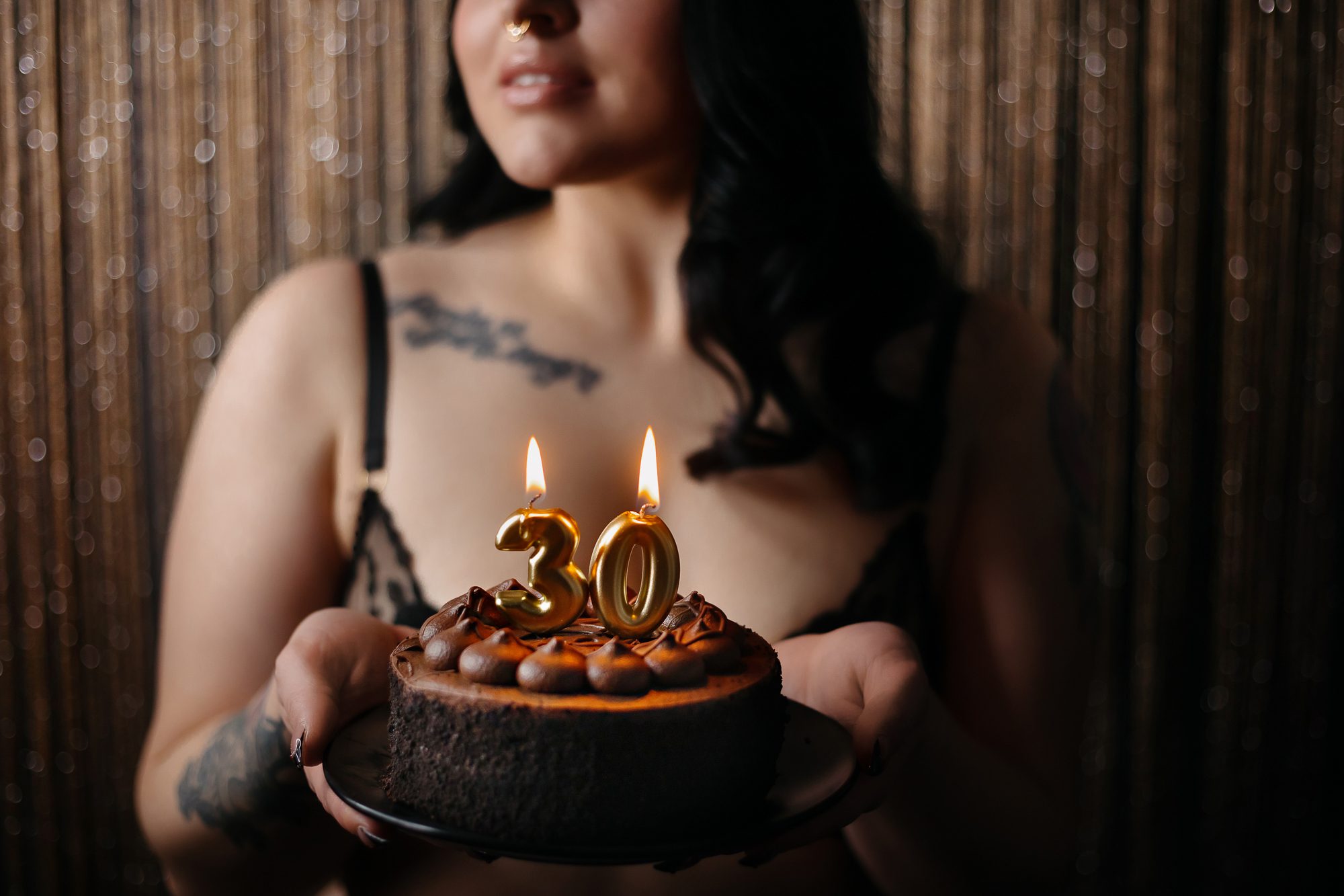 Denver boudoir client posing for birthday photo shoot