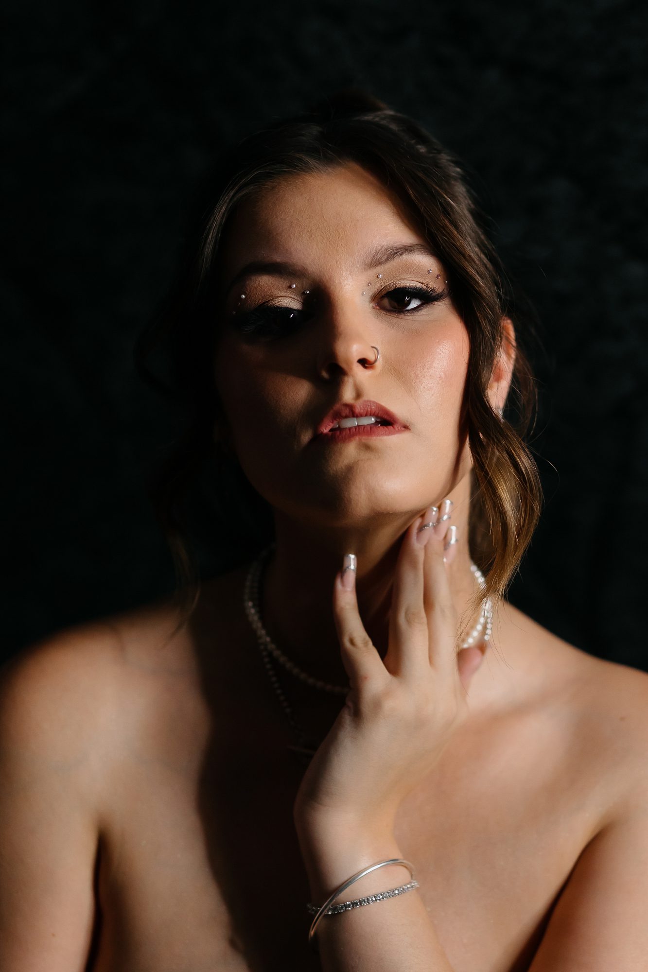 Denver boudoir client posing for birthday photo shoot