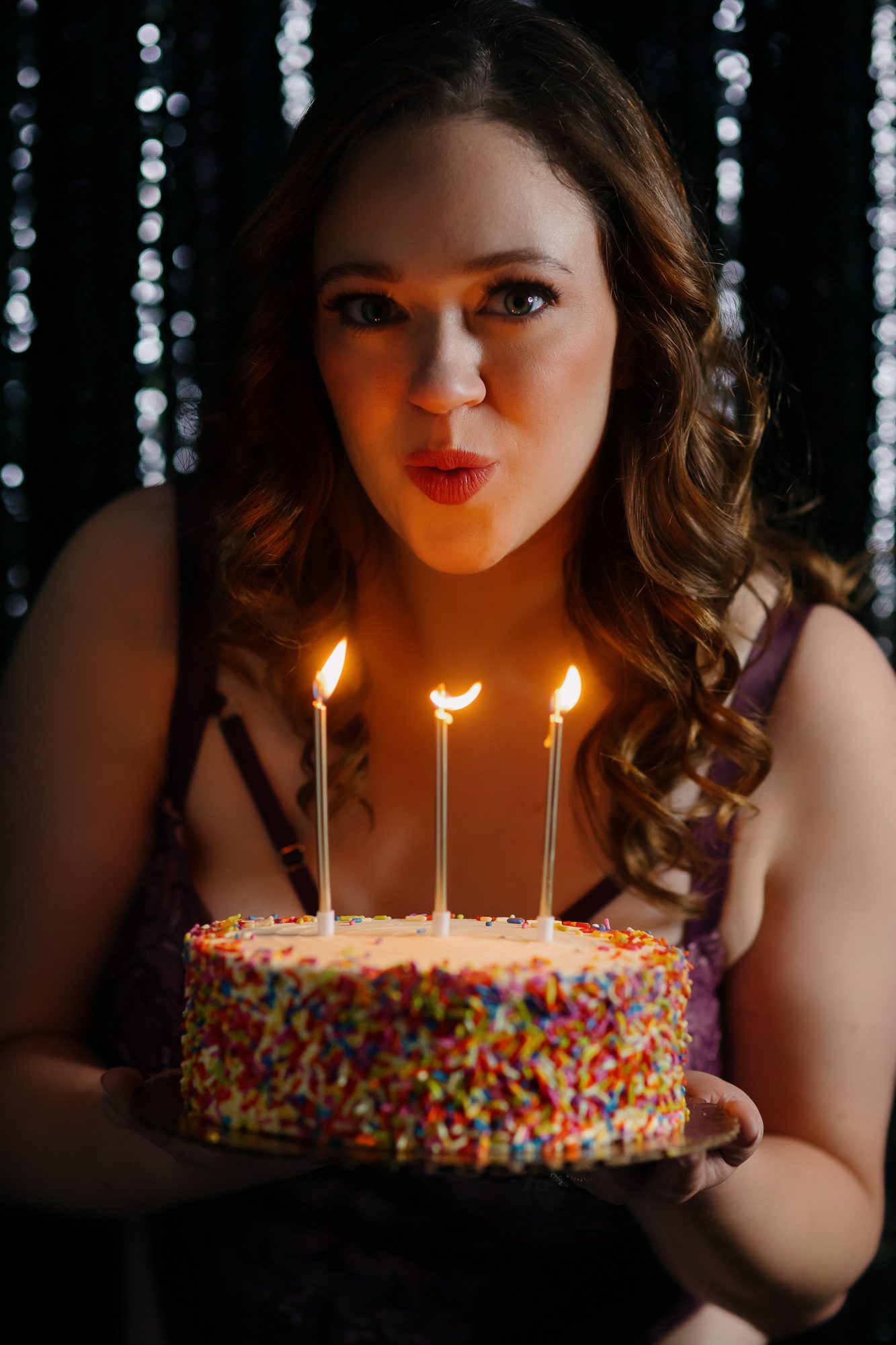 Denver boudoir client posing for birthday photo shoot