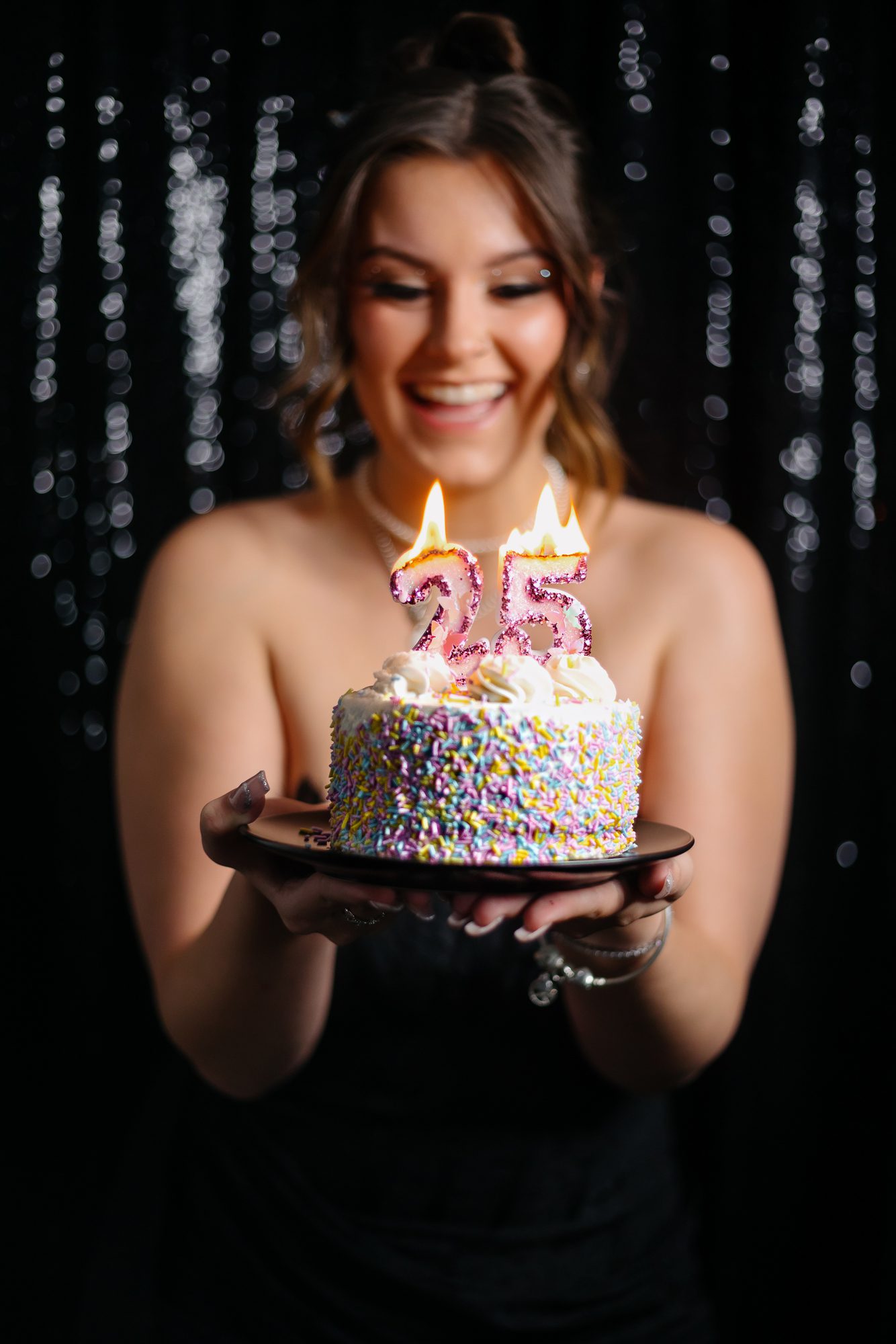 Denver boudoir client posing for birthday photo shoot