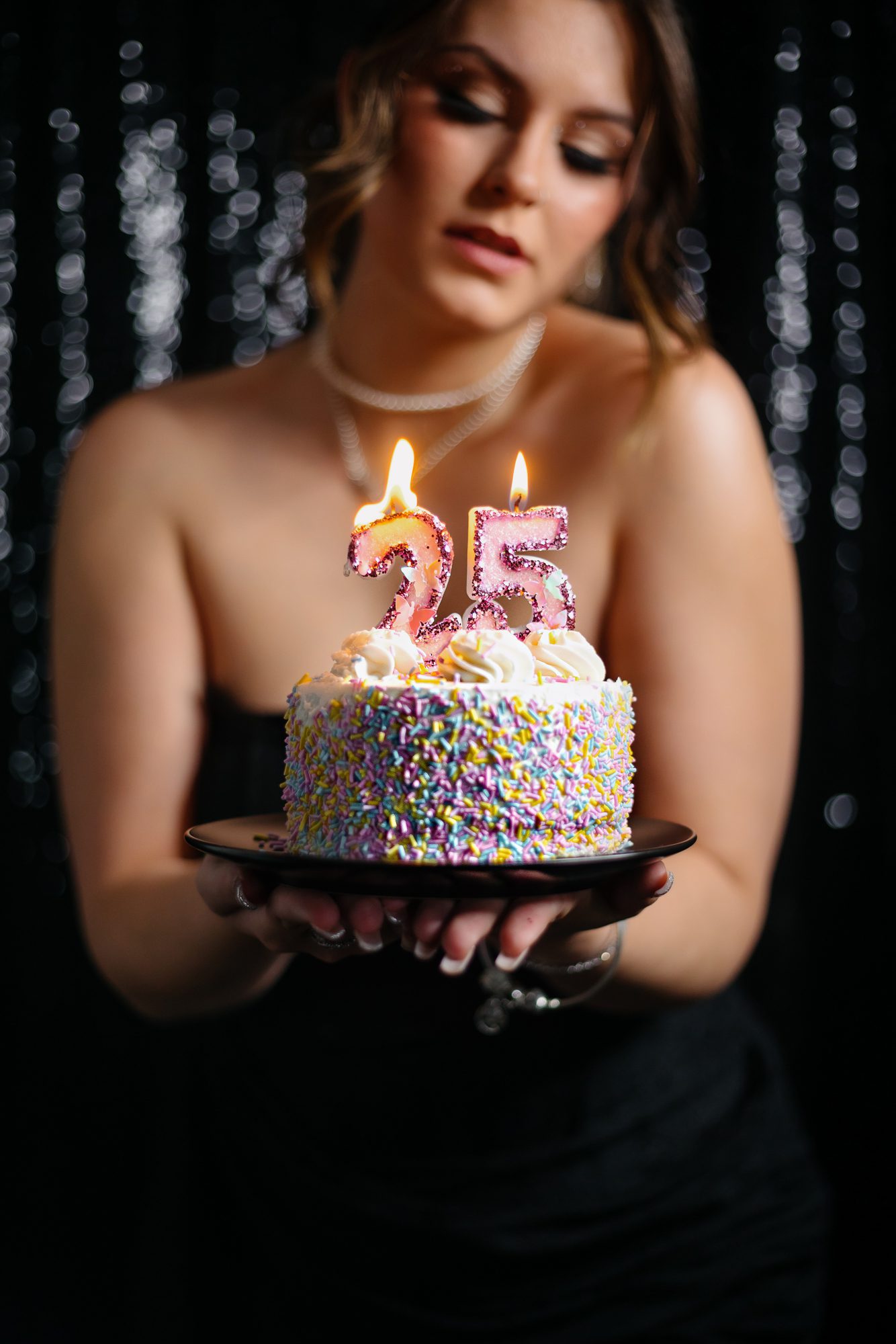 Denver boudoir client posing for birthday photo shoot