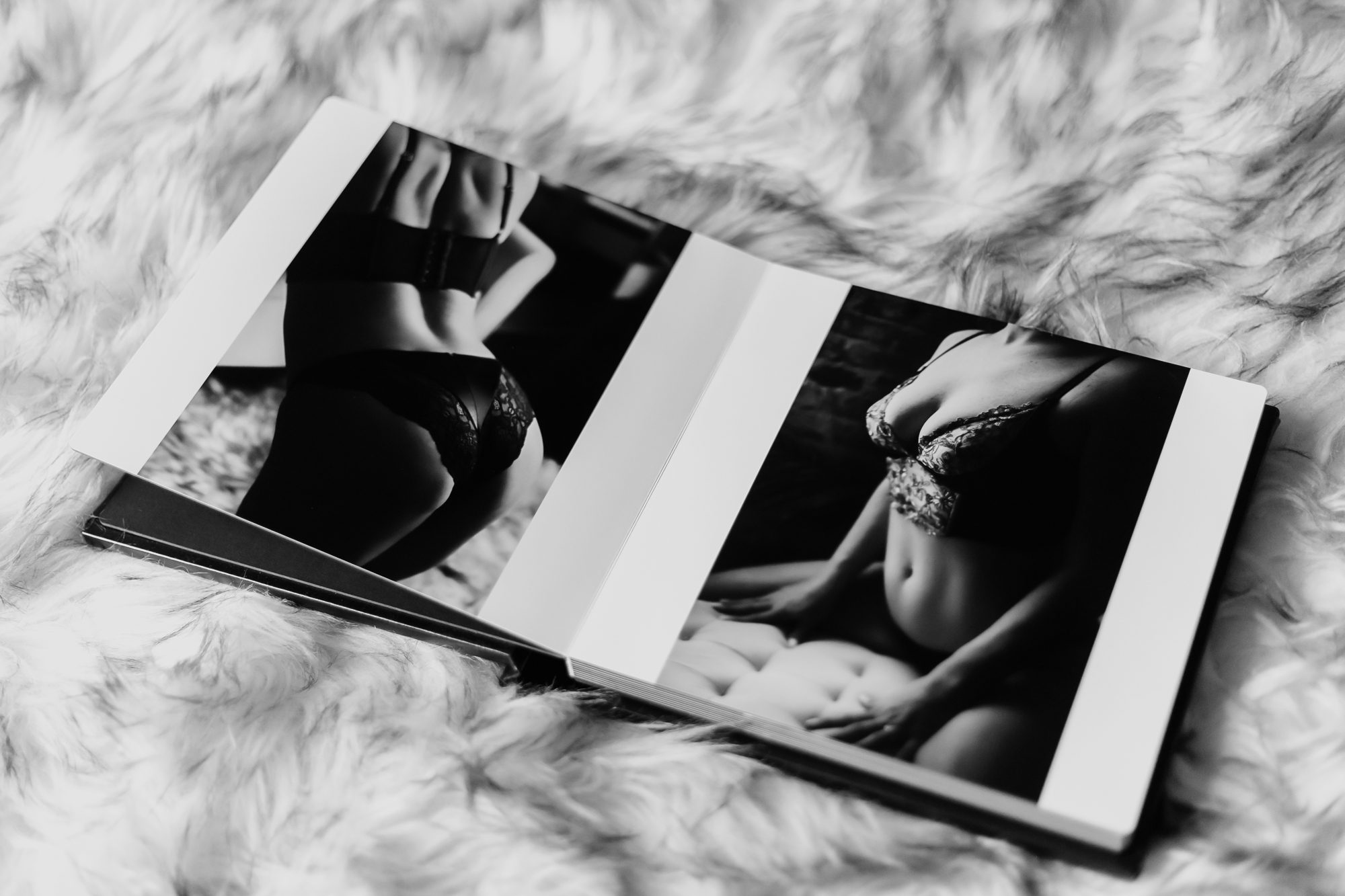 Photo of boudoir album laying on rug