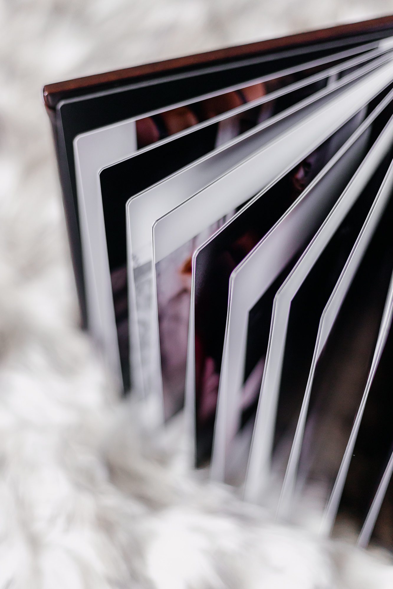 Photo of boudoir album laying on rug