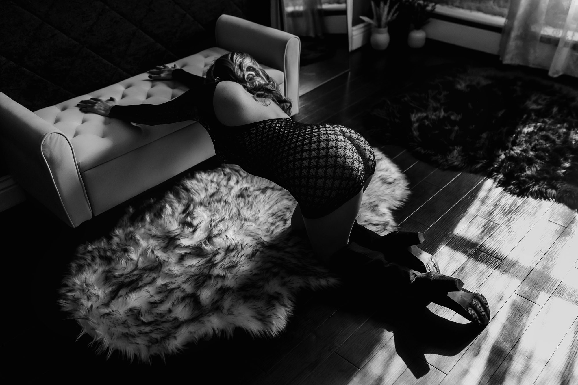 Denver boudoir client posing for boudoir shoot