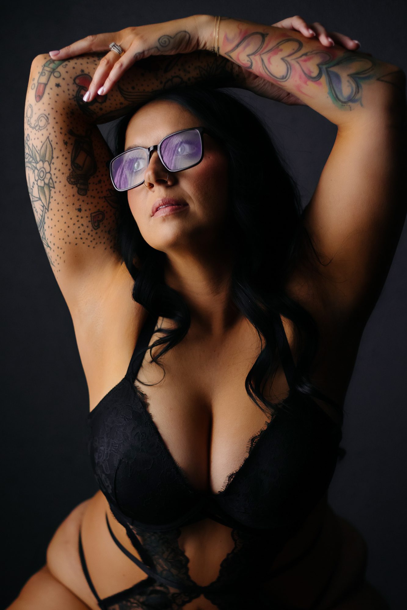 Boudoir in glasses: a client wearing glasses during a boudoir shoot