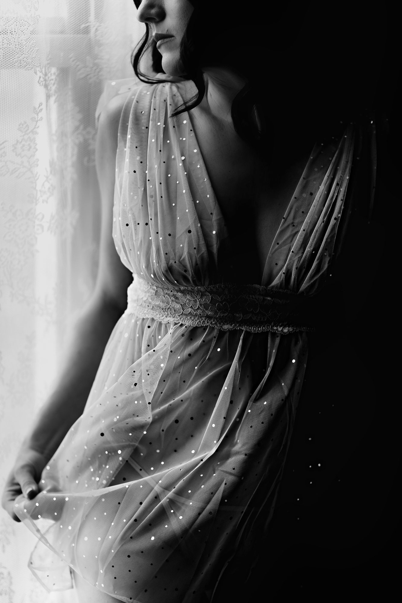 Photo of Denver boudoir client posing for boudoir shoot